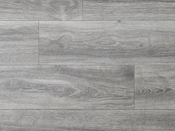 Grey oak-look rigid-core luxury vinyl plank, the waterproof flooring Artistry Floors installs across Dallas-Fort Worth